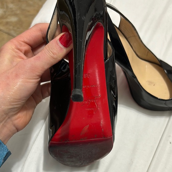 Christian Louboutin Black Heels with Peep-Toe Design and Stiletto Heel - Picture 2 of 7